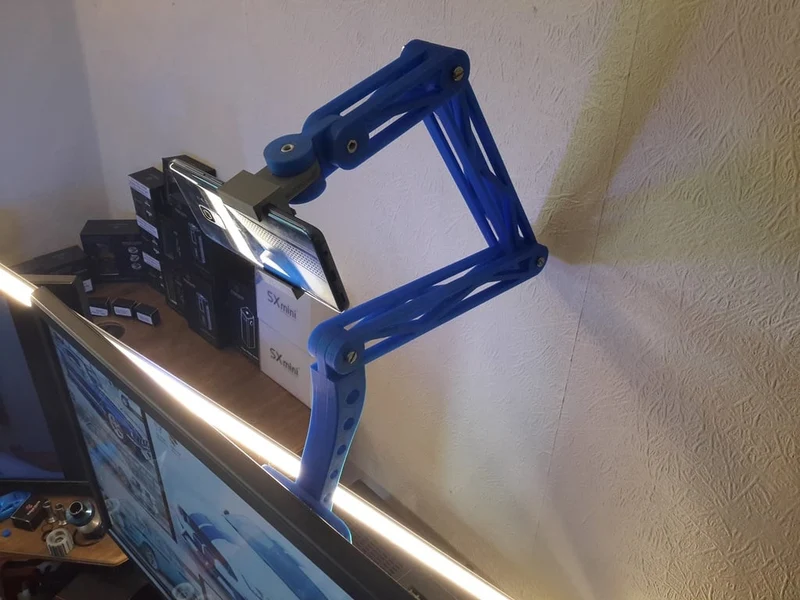 Support de téléphone réglable monté sur VESA pour webcam et écrans de PC