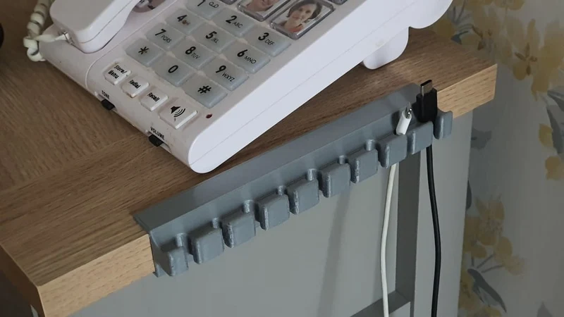 Support de câble pour table Next Malvern Eg (bord de 25 mm)