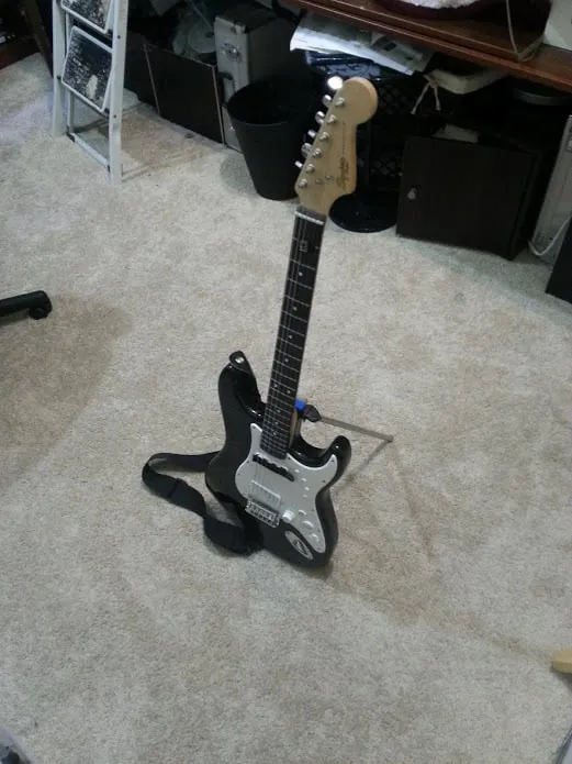 Support de guitare électrique avec fixation Fender