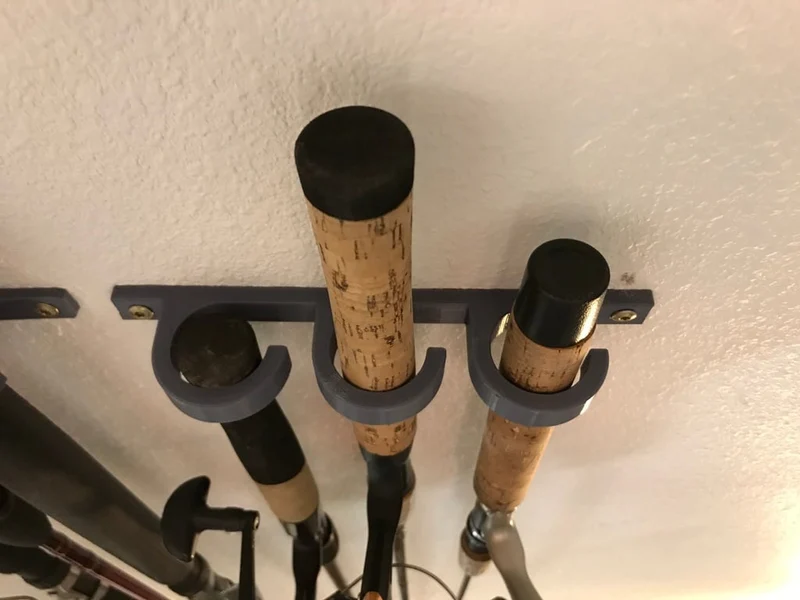 3 supports muraux pour cannes à pêche
