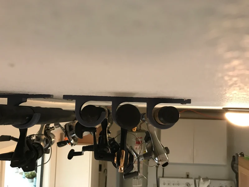 3 supports muraux pour cannes à pêche