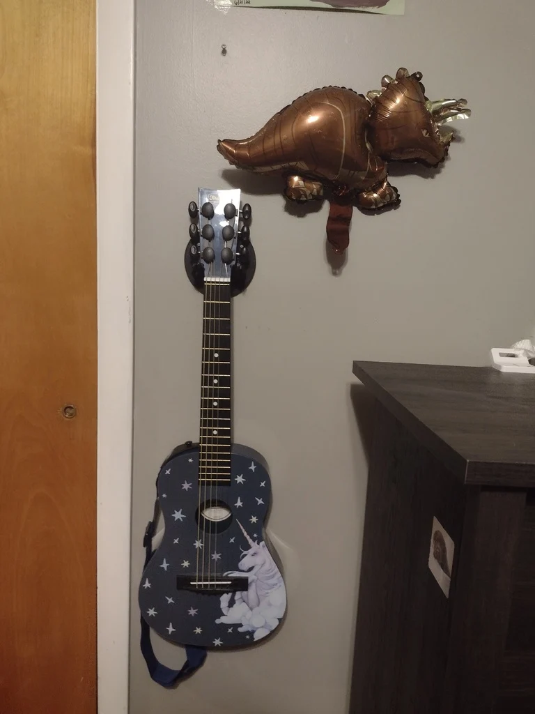 Support mural pour guitare T-rex avec design de dinosaure