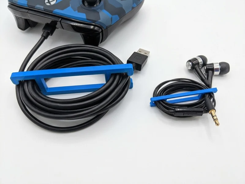 Enrouleur de câble universel pour jeux et USB