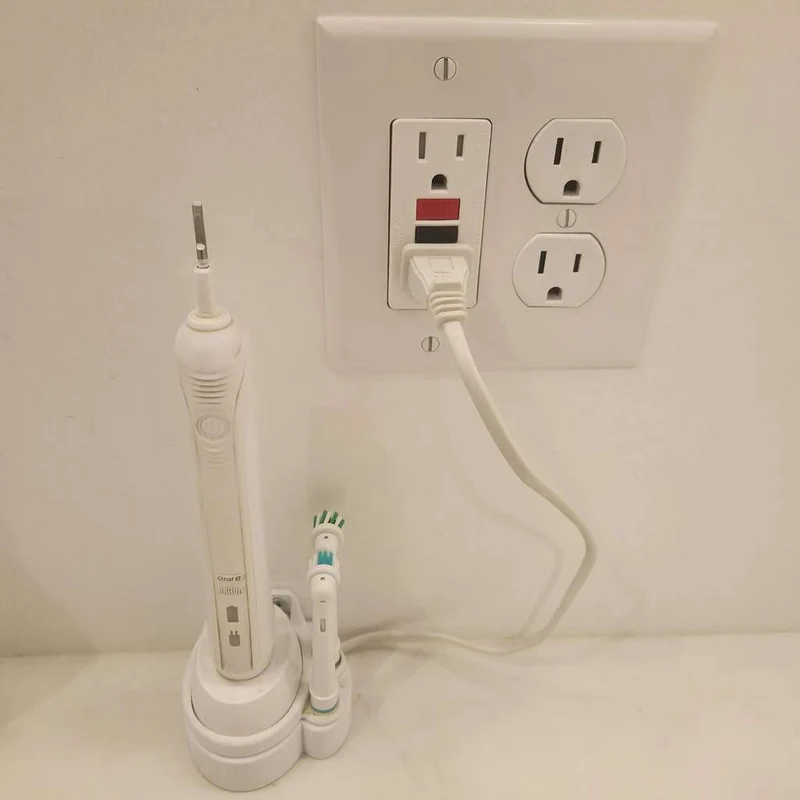 Support mural Oral B pour chargeur de brosse à dents avec gestion des câbles