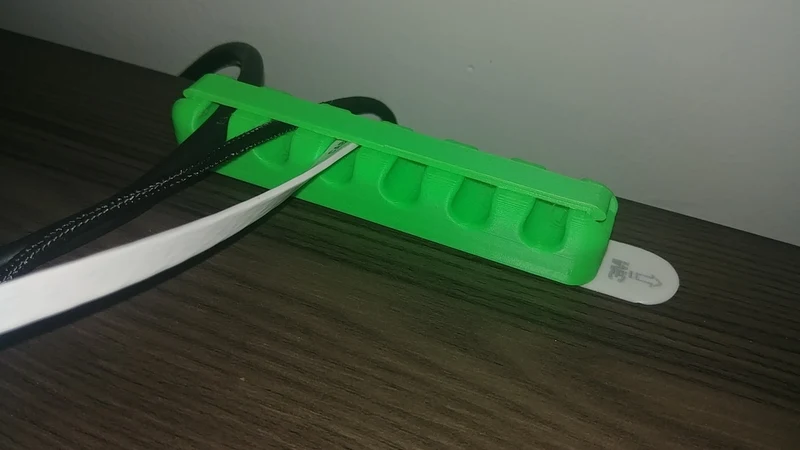 Support de câble avec fermeture à pression