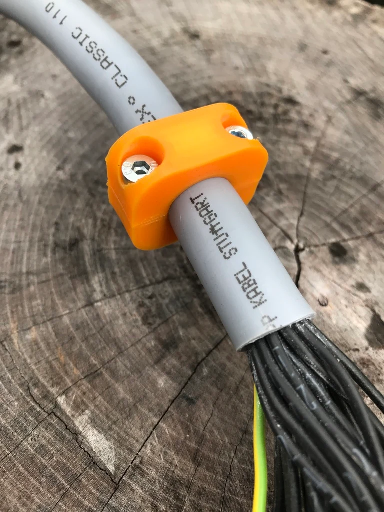 Serre-câble et serre-câble pour câbles et tubes