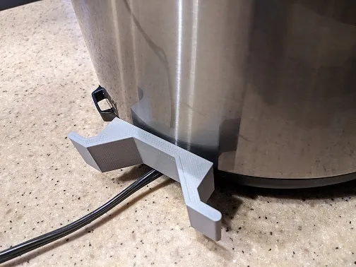 Instant Pot IP-LUX : Support de câble pratique pour un rangement organisé