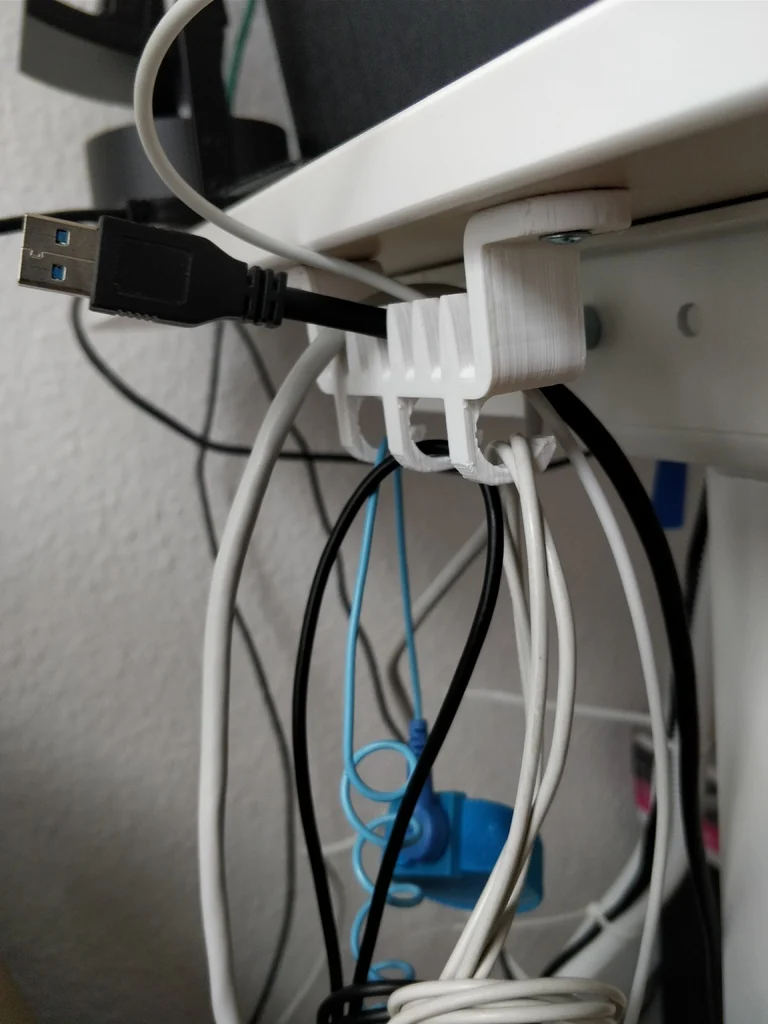Support de câble et suspension sous le bureau