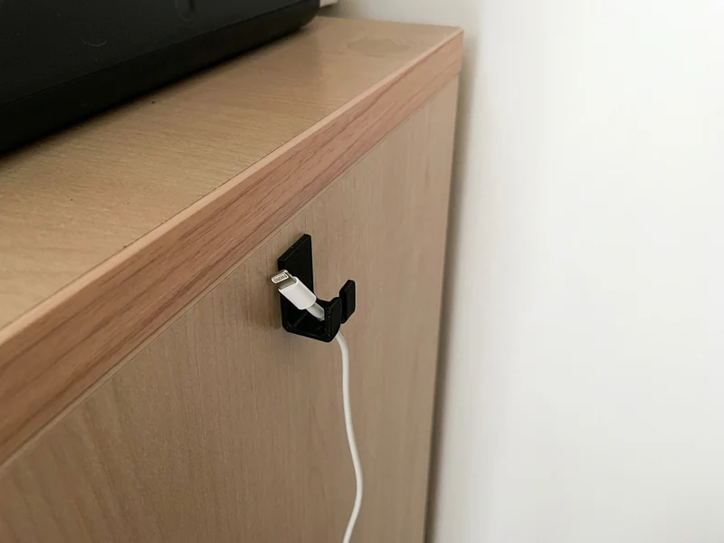Crochet de câble intelligent pour chargeur de smartphone