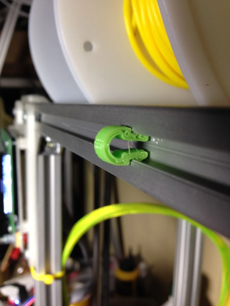 Support de câble rotatif pour profils d'extrusion