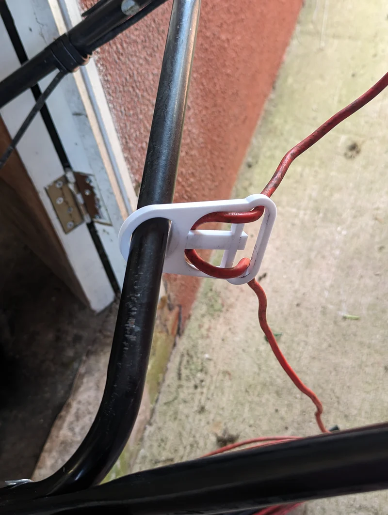 Support de câble pour tondeuse à gazon électrique