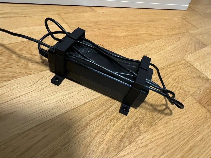 Support d'adaptateur secteur paramétrique avec serre-câble