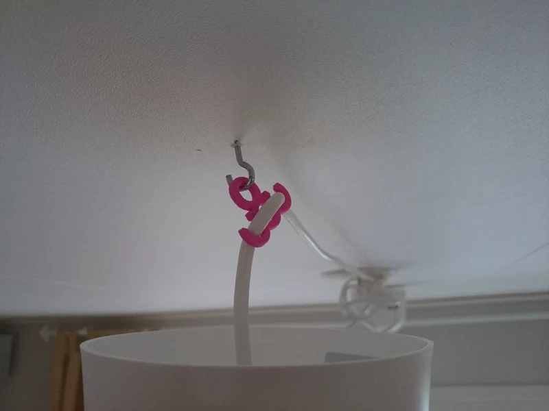 Serre-câble pour lampes et câbles