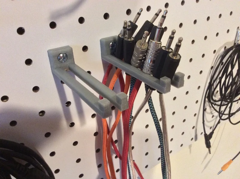 Support de câble Pegboard pour câbles audio de 3,5 mm