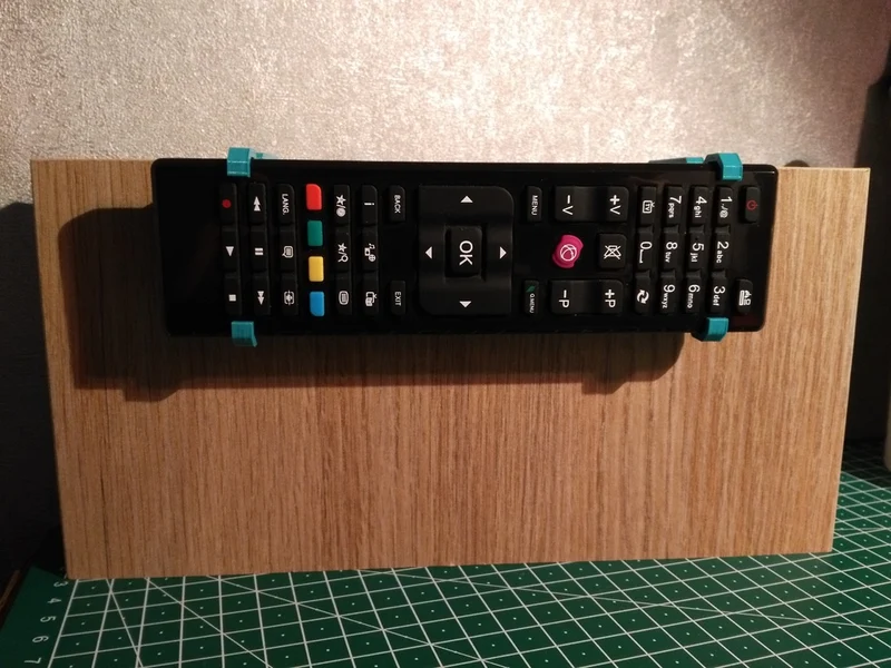 Support de télécommande suspendu au lit pour TV