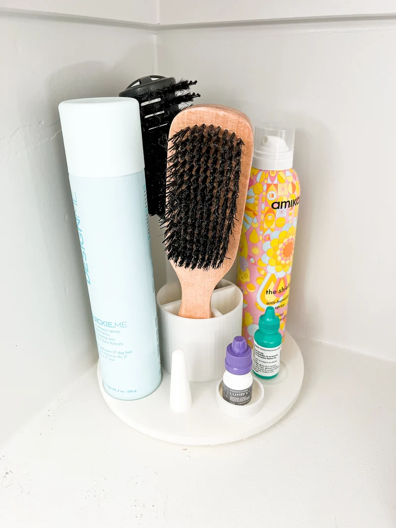 Support rotatif pour outils de coiffure