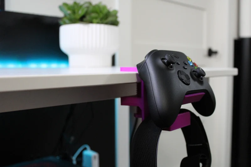 Support de serrage universel pour contrôleur et casque