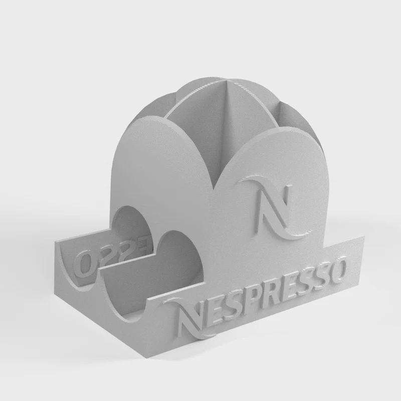 Distributeur Nespresso avec couvercle en forme de dôme pour le stockage des capsules