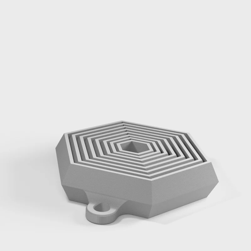 Porte-clés fidget hexagonal