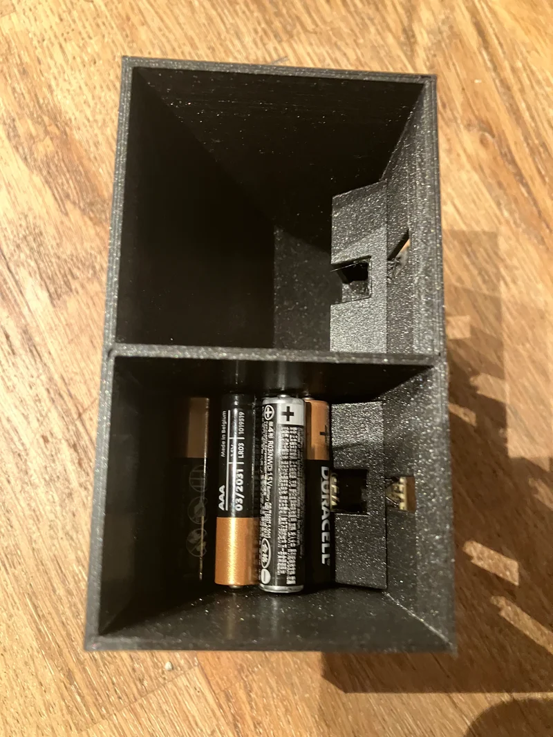 Insertion du porte-piles AA et AAA
