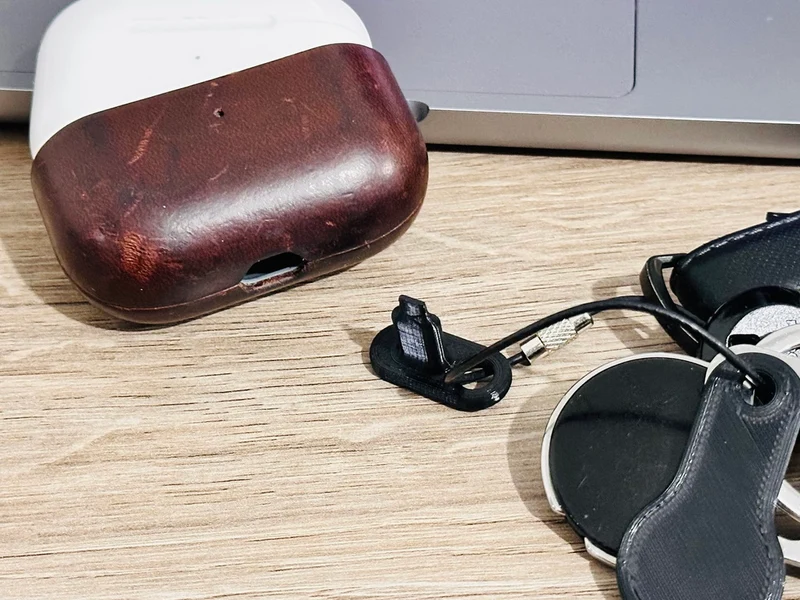 AirPodBuddy : Outil de retrait de l'étui des AirPods (porte-clés)