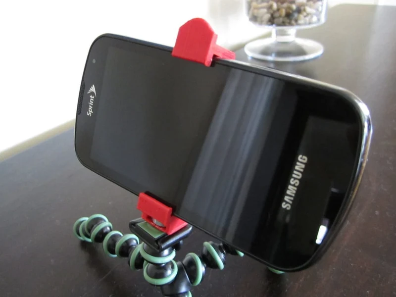Support universel pour téléphone sur trépied
