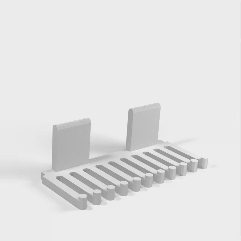 Peigne porte-câbles sans crochet pour utilisation avec du ruban adhésif double face ou des bandes adhésives de contact 3M