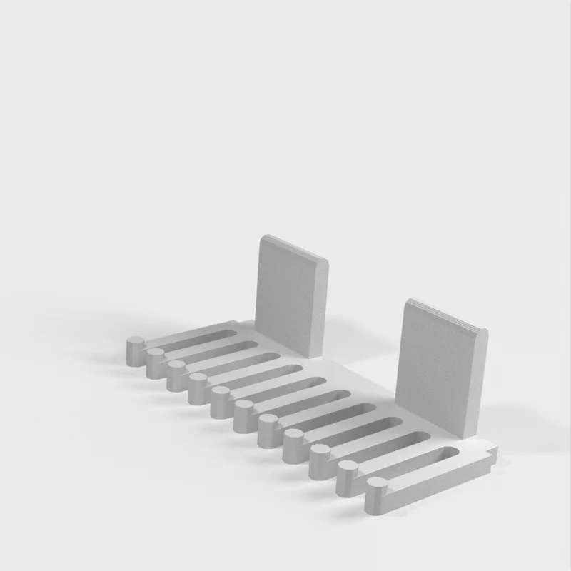Peigne porte-câbles sans crochet pour utilisation avec du ruban adhésif double face ou des bandes adhésives de contact 3M