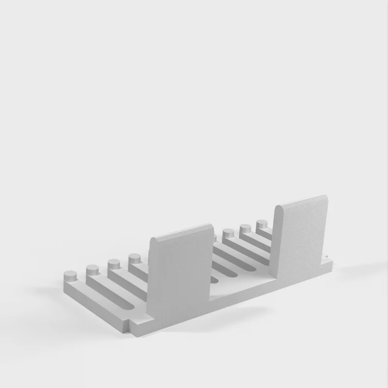 Peigne porte-câbles sans crochet pour utilisation avec du ruban adhésif double face ou des bandes adhésives de contact 3M