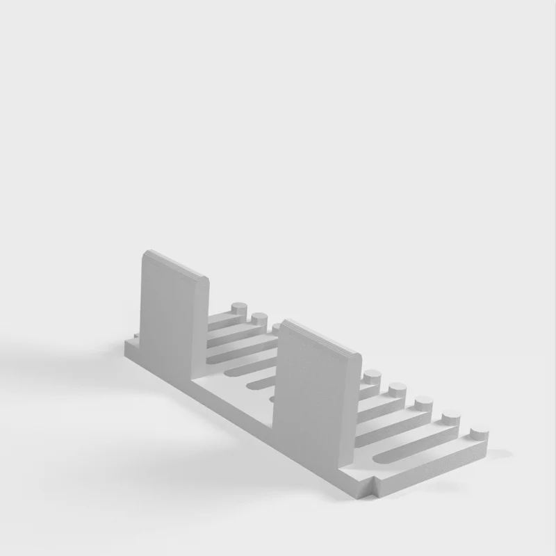 Peigne porte-câbles sans crochet pour utilisation avec du ruban adhésif double face ou des bandes adhésives de contact 3M