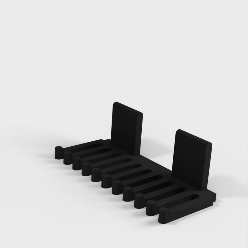 Peigne porte-câbles sans crochet pour utilisation avec du ruban adhésif double face ou des bandes adhésives de contact 3M