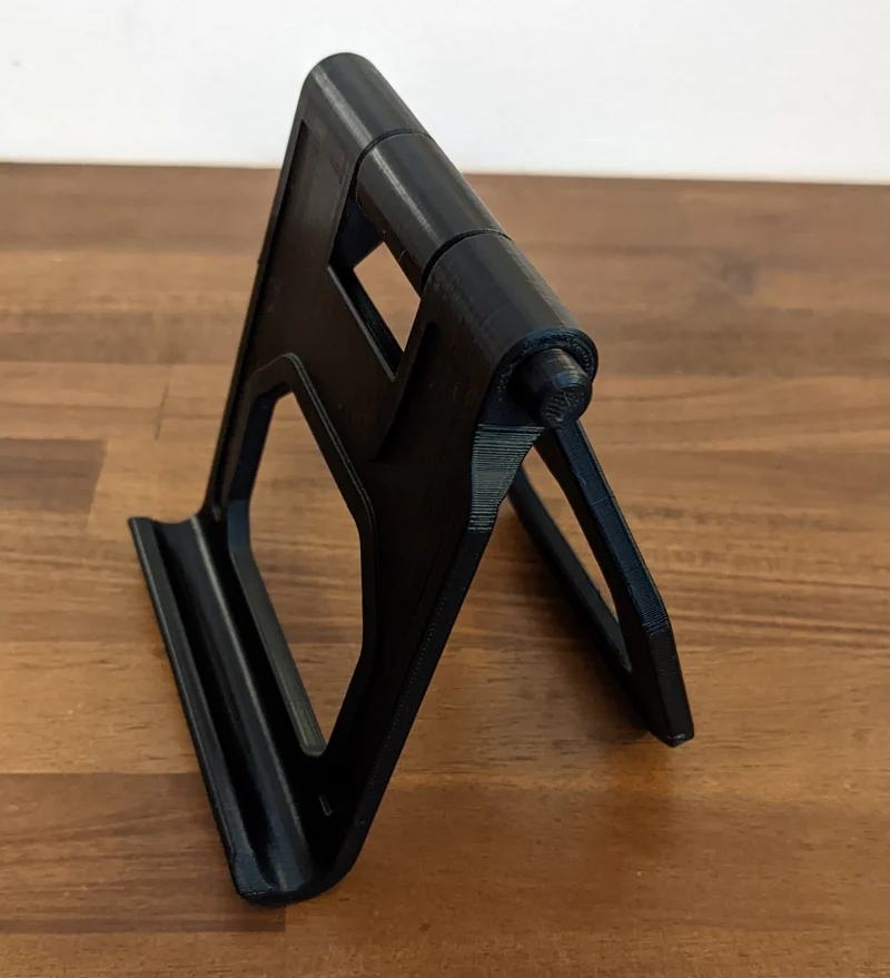 Support réglable pour tablette/téléphone avec fonction bouton-poussoir