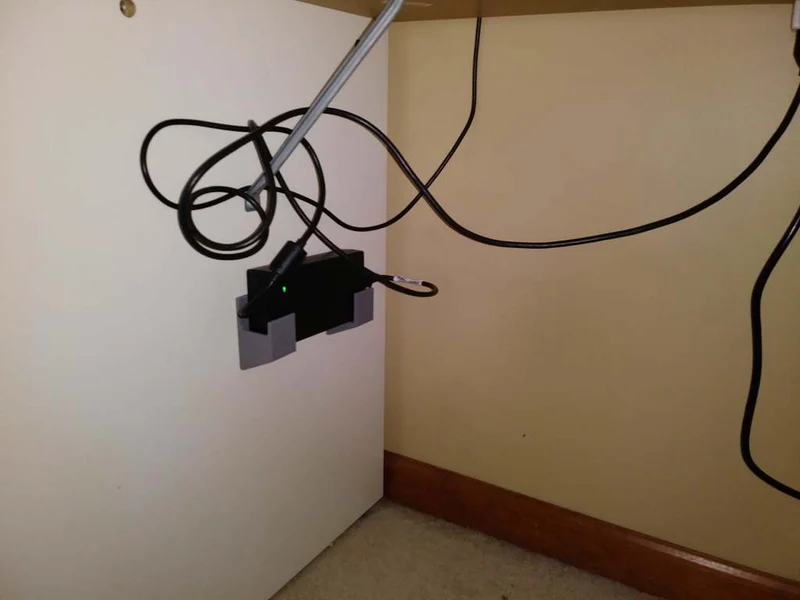 Support mural universel pour adaptateur secteur