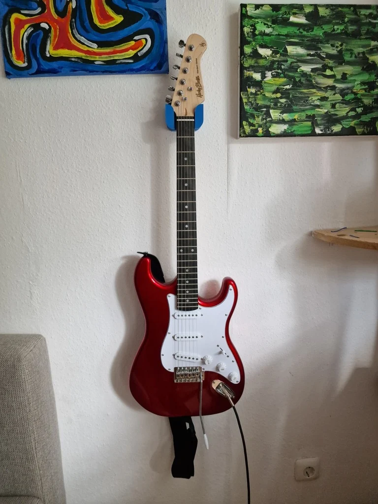 Support de guitare avec espace pour plectres