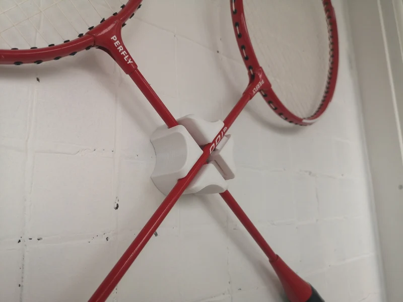Support mural pour raquette de badminton