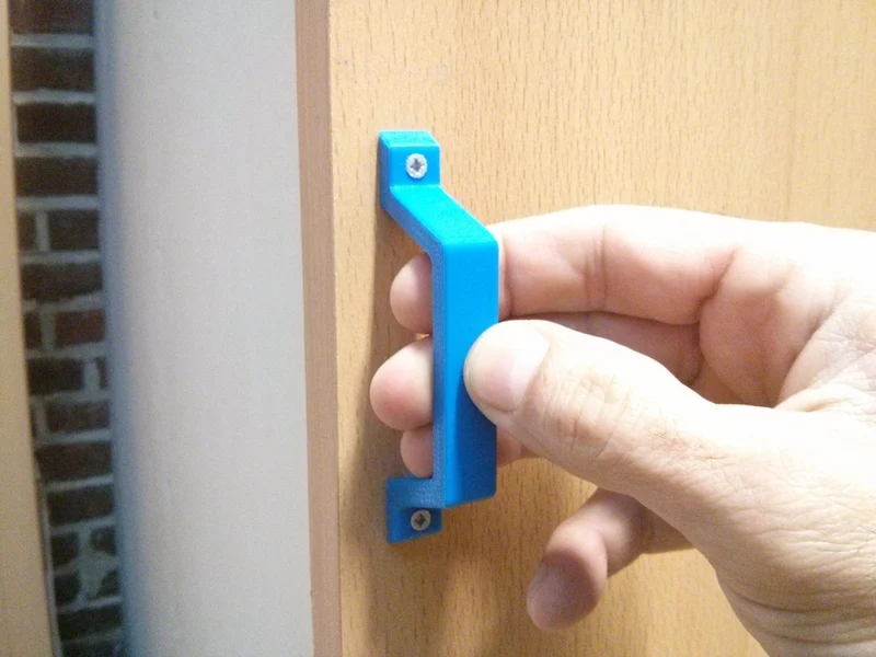 Poignées de tirage pour portes et tiroirs d'armoires