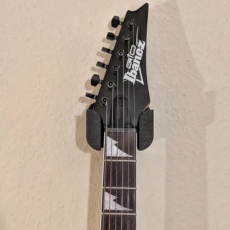Suspension pour guitare électrique